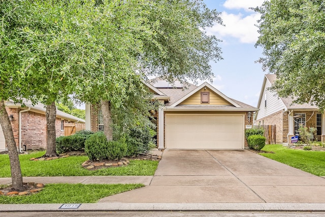 3015 Crescent Oaks Park Ln, Spring, TX 77386 - view of property hidden behind natural elements featuring brick siding, concrete driveway, and a shingled roof