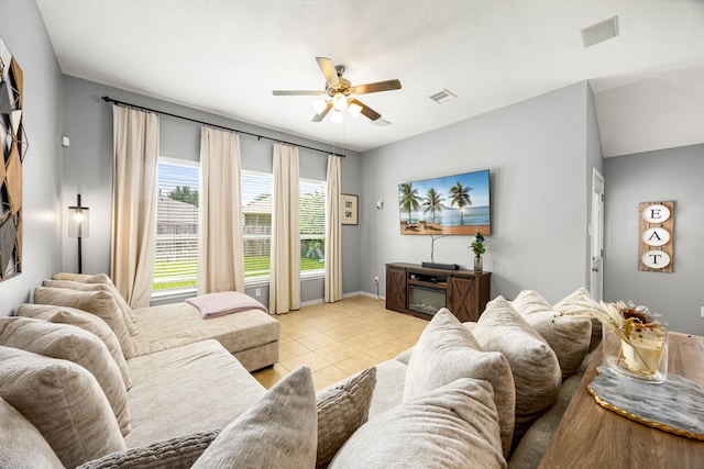 3015 Crescent Oaks Park Ln, Spring, TX 77386 - living area featuring a ceiling fan and light tile patterned floors