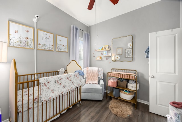 3015 Crescent Oaks Park Ln, Spring, TX 77386 - bedroom featuring a nursery area, wood finished floors, and a ceiling fan