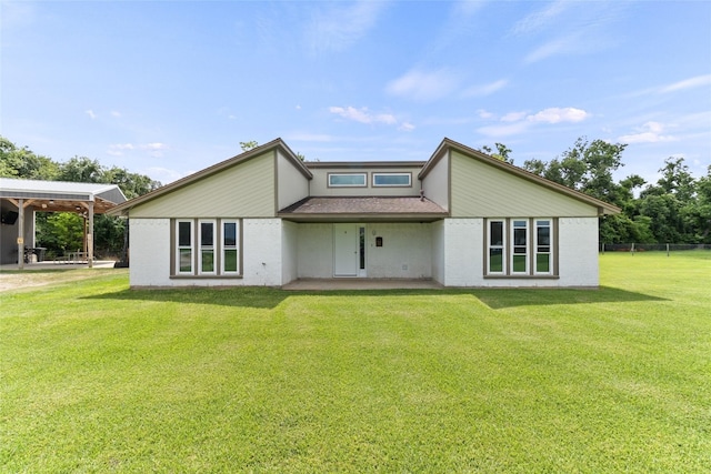 500 E Main St, Clute, TX 77531 - back of house featuring a patio and a shingled roof