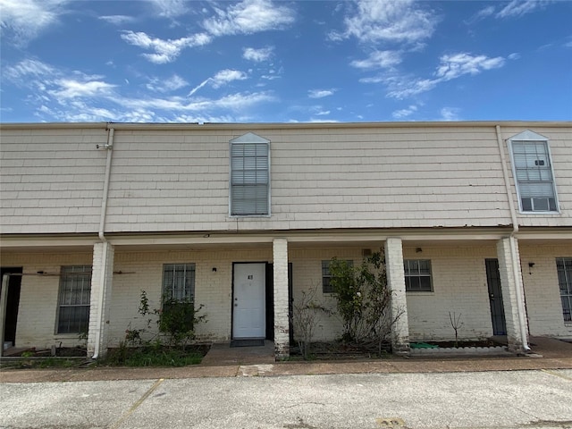6201 Ranchester Dr Unit 48, Houston, TX 77036 - townhome / multi-family property featuring brick siding and mansard roof