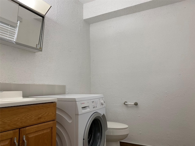 6201 Ranchester Dr Unit 48, Houston, TX 77036 - laundry room with a textured wall