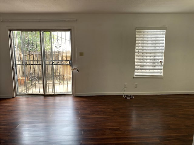 6201 Ranchester Dr Unit 48, Houston, TX 77036 - unfurnished room with baseboards and dark wood-style flooring