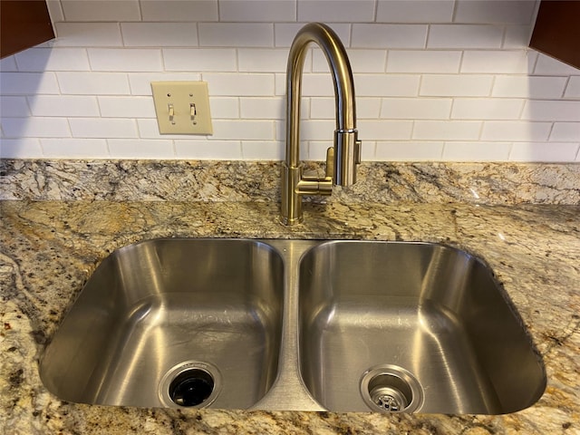 6201 Ranchester Dr Unit 48, Houston, TX 77036 - kitchen view of stone counters and backsplash