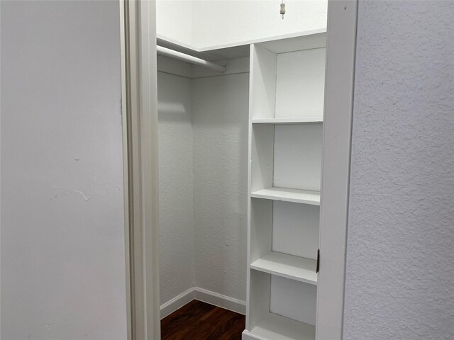 6201 Ranchester Dr Unit 48, Houston, TX 77036 - walk in closet featuring dark wood-style flooring