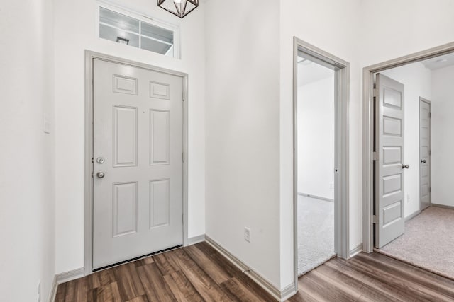 1418 Lake Ridge Dr, Brenham, TX 77833 - foyer with dark wood-type flooring and baseboards