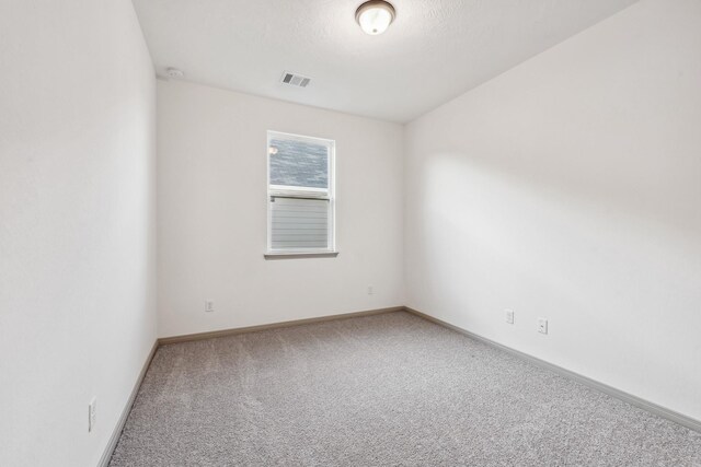 1418 Lake Ridge Dr, Brenham, TX 77833 - unfurnished room with carpet floors and baseboards