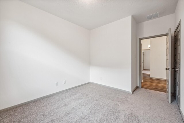 1418 Lake Ridge Dr, Brenham, TX 77833 - carpeted spare room featuring baseboards