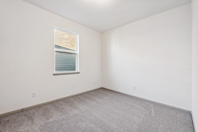 1418 Lake Ridge Dr, Brenham, TX 77833 - spare room with carpet flooring and baseboards