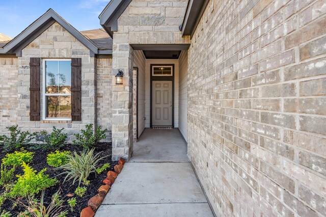 1418 Lake Ridge Dr, Brenham, TX 77833 - view of exterior entry with stone siding