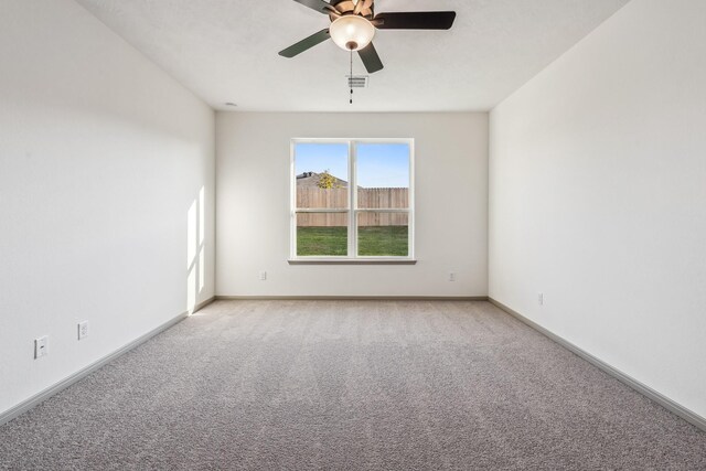 1418 Lake Ridge Dr, Brenham, TX 77833 - spare room with carpet and ceiling fan