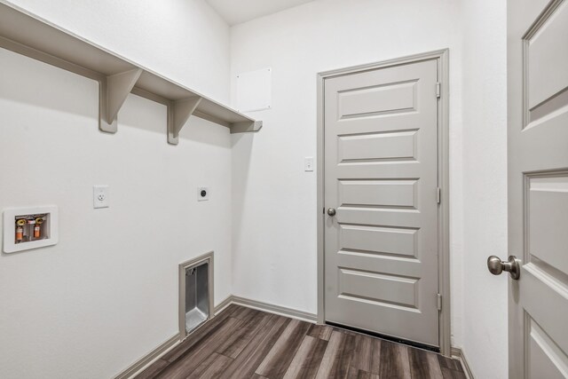 1418 Lake Ridge Dr, Brenham, TX 77833 - laundry area featuring electric dryer hookup, dark wood finished floors, and washer hookup
