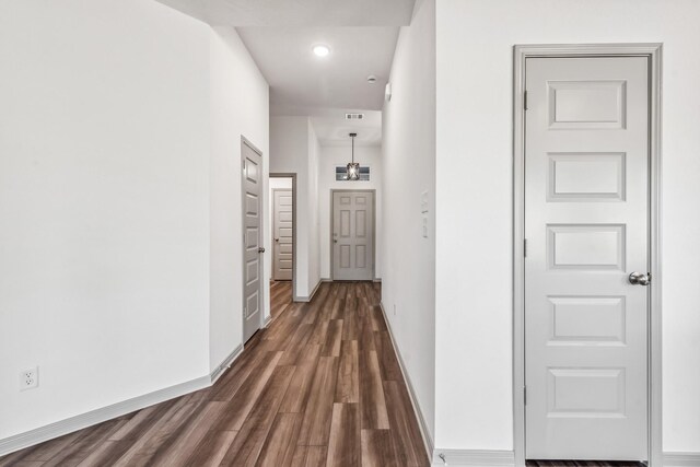 1418 Lake Ridge Dr, Brenham, TX 77833 - hallway featuring dark wood-style flooring and recessed lighting