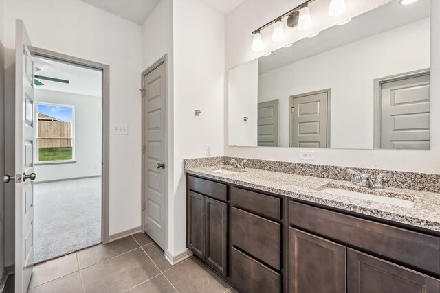 1418 Lake Ridge Dr, Brenham, TX 77833 - bathroom with double vanity and tile patterned flooring