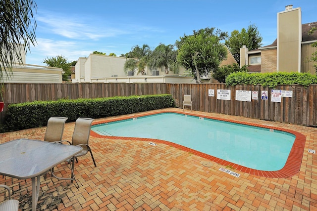 1920 Augusta Dr Unit 19, Houston, TX 77057 - community pool featuring a fenced backyard and a patio