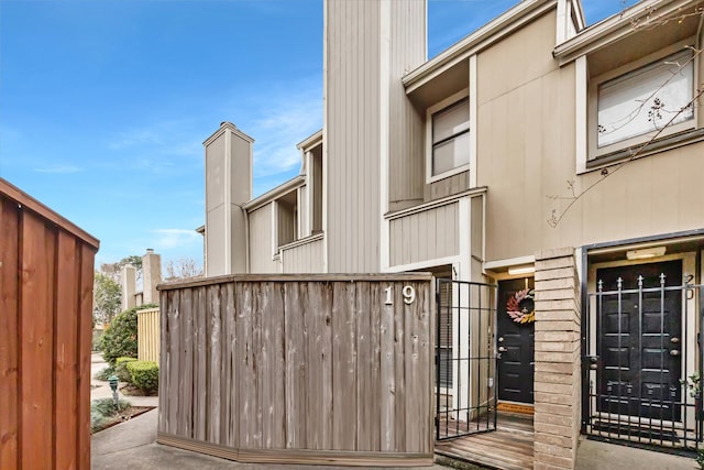 1920 Augusta Dr Unit 19, Houston, TX 77057 - view of home's exterior with a chimney
