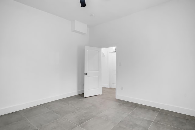 17128 Spindle Oaks Dr, Conroe, TX 77385 - spare room with ceiling fan and baseboards