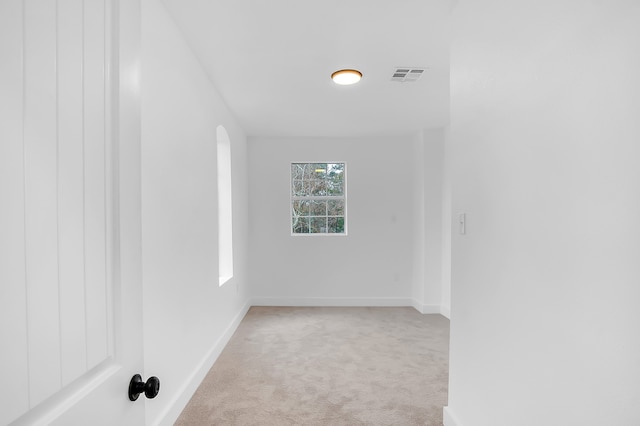 17128 Spindle Oaks Dr, Conroe, TX 77385 - unfurnished room with light colored carpet and arched walkways