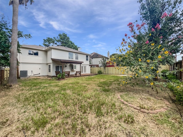 7007 Madison Trl, Houston, TX 77084 - back of house with a fenced backyard and a chimney