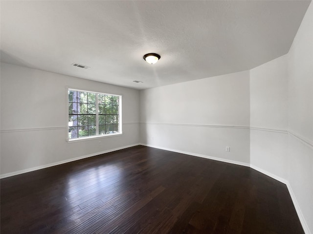 7007 Madison Trl, Houston, TX 77084 - empty room featuring dark wood-type flooring