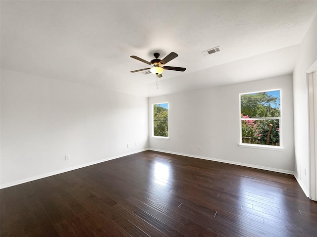 7007 Madison Trl, Houston, TX 77084 - spare room with a ceiling fan and dark wood finished floors