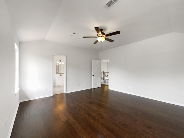 7007 Madison Trl, Houston, TX 77084 - spare room featuring ceiling fan, vaulted ceiling, and dark wood-style floors