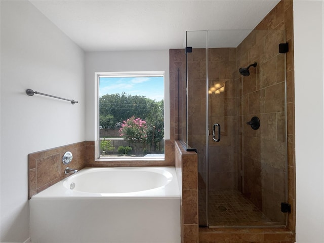 7007 Madison Trl, Houston, TX 77084 - bathroom with a garden tub and a shower stall
