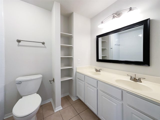 7007 Madison Trl, Houston, TX 77084 - full bathroom with double vanity and tile patterned flooring