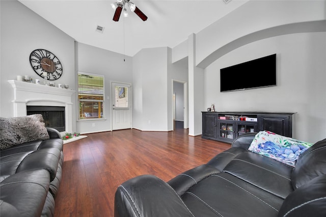 506 Glenwood Ridge Dr, Spring, TX 77386 - living room featuring a ceiling fan, wood finished floors, a fireplace, and high vaulted ceiling