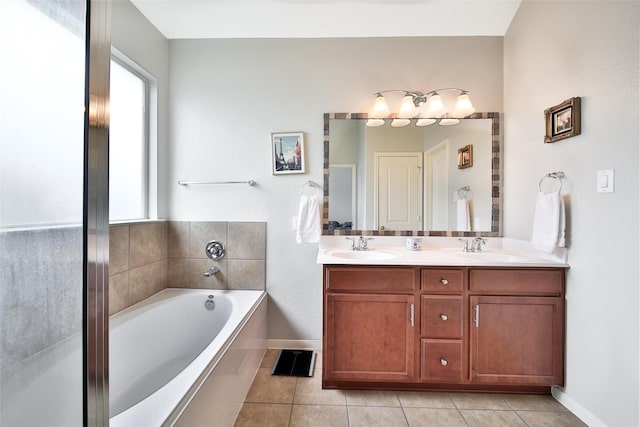 506 Glenwood Ridge Dr, Spring, TX 77386 - bathroom featuring tile patterned floors, double vanity, and a bath