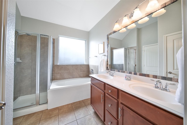 506 Glenwood Ridge Dr, Spring, TX 77386 - full bathroom featuring tile patterned flooring, a stall shower, a garden tub, double vanity, and vaulted ceiling