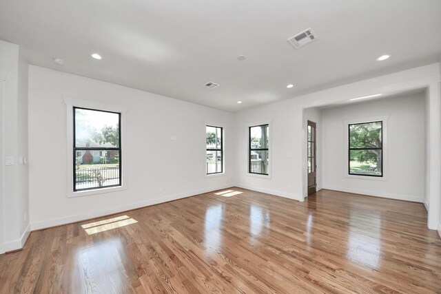 4541 Walker St, Houston, TX 77023 - unfurnished room featuring plenty of natural light, light wood-type flooring, and recessed lighting