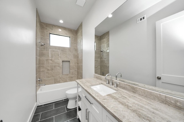4541 Walker St, Houston, TX 77023 - bathroom with tile patterned flooring, vanity, shower / tub combination, and recessed lighting