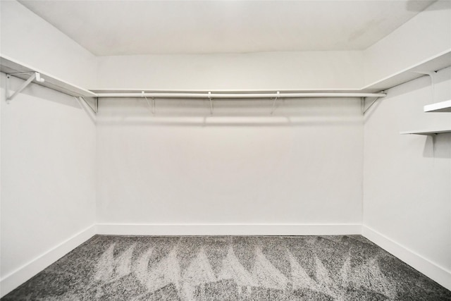 5817 Beechnut St, Houston, TX 77074 - spacious closet featuring carpet floors