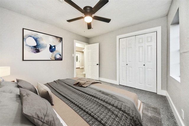 5817 Beechnut St, Houston, TX 77074 - bedroom featuring carpet, a ceiling fan, and a closet
