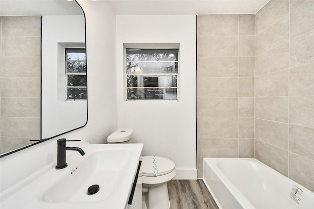 5817 Beechnut St, Houston, TX 77074 - full bath with wood finished floors and vanity