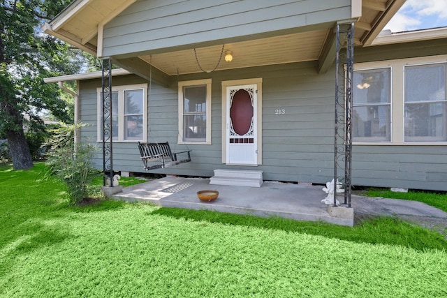 213 E Feagin St, Livingston, TX 77351 - entrance to property featuring a lawn
