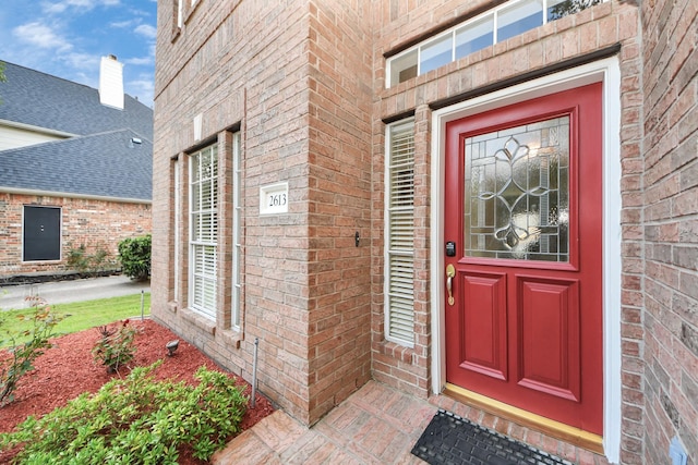 2613 Broussard Ct, Seabrook, TX 77586 - property entrance featuring brick siding