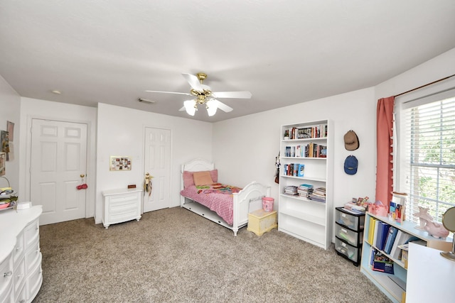 2613 Broussard Ct, Seabrook, TX 77586 - carpeted bedroom with ceiling fan