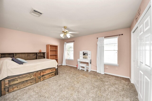 2613 Broussard Ct, Seabrook, TX 77586 - bedroom with carpet flooring, a closet, and ceiling fan