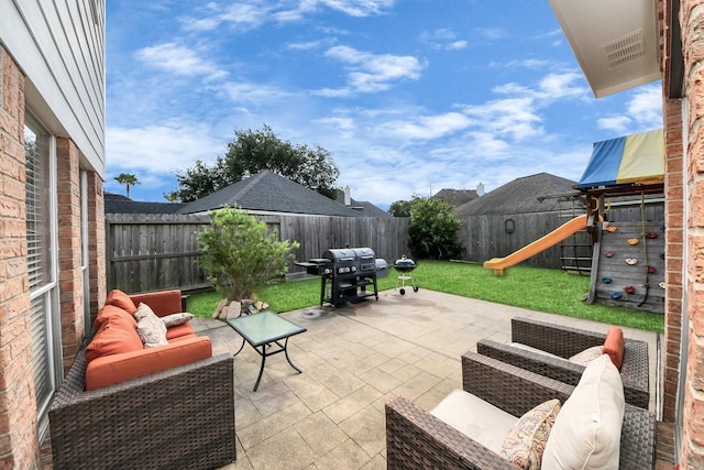 2613 Broussard Ct, Seabrook, TX 77586 - fenced backyard featuring a playground, area for grilling, an outdoor hangout area, and a patio area