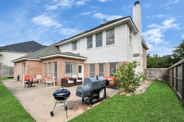 2613 Broussard Ct, Seabrook, TX 77586 - back of house with an outdoor living space with a fire pit, a fenced backyard, a patio, and a chimney