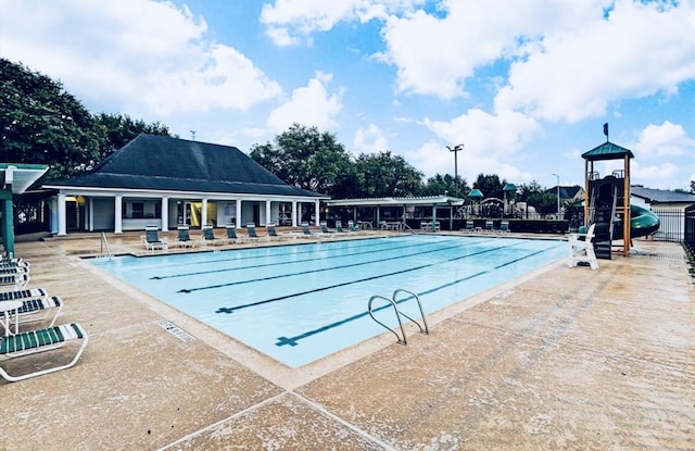 2613 Broussard Ct, Seabrook, TX 77586 - community pool with a patio