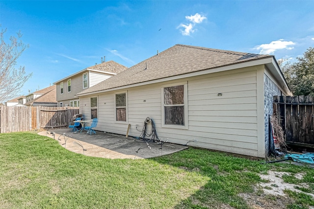2335 Village Leaf Dr, Spring, TX 77386 - rear view of property featuring a patio, a shingled roof, and a fenced backyard