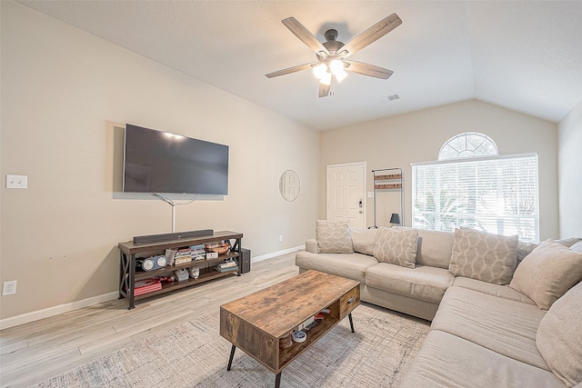 2335 Village Leaf Dr, Spring, TX 77386 - living room with light wood-style floors, a ceiling fan, and vaulted ceiling