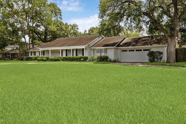 7525 Middlewood St, Houston, TX 77063 - single story home featuring a front lawn, a garage, and driveway