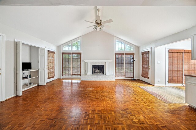 7525 Middlewood St, Houston, TX 77063 - unfurnished living room with ceiling fan, plenty of natural light, a brick fireplace, and high vaulted ceiling