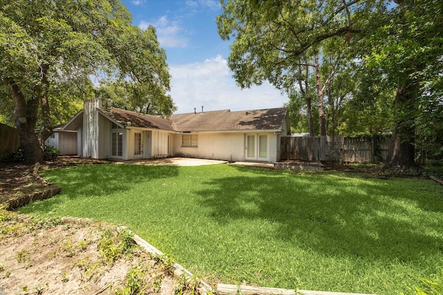 7525 Middlewood St, Houston, TX 77063 - rear view of property featuring a patio and french doors