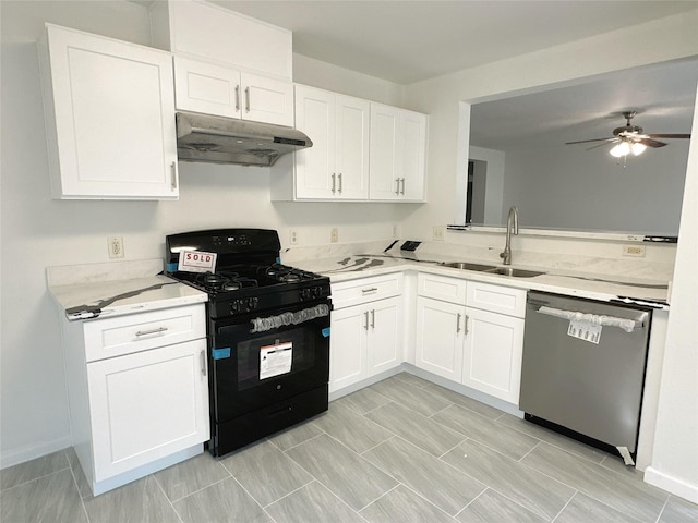 13426 Sanderford Ln, Houston, TX 77083 - kitchen with black gas range oven, dishwasher, under cabinet range hood, a ceiling fan, and white cabinetry