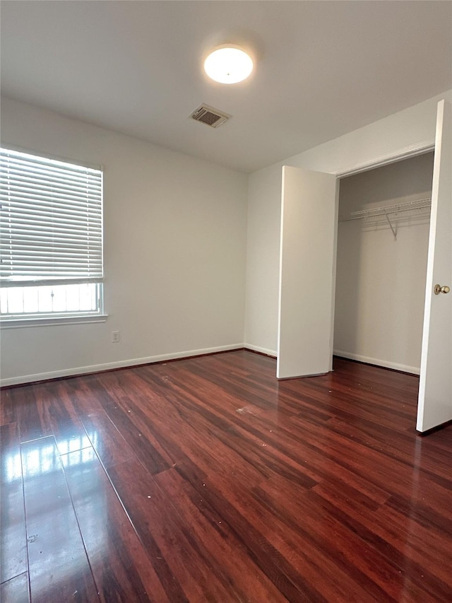 13426 Sanderford Ln, Houston, TX 77083 - unfurnished bedroom with wood finished floors and a closet